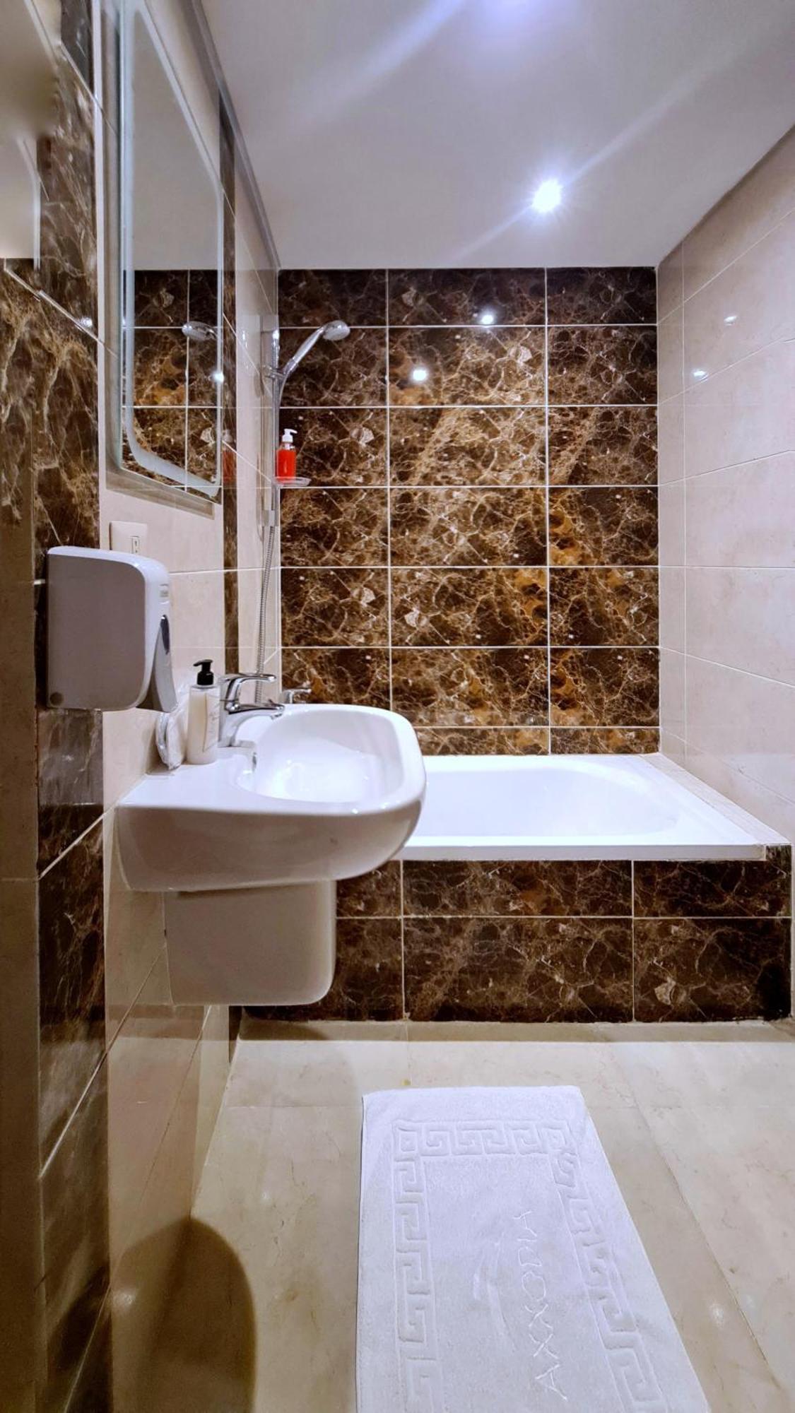 Axxodia- Duplex Porto New Cairo Aparthotel Buitenkant foto